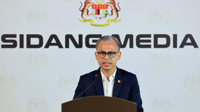 Communications Minister Datuk Fahmi Fadzil - Photo by BERNAMA