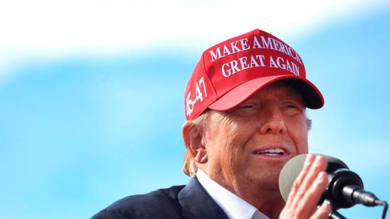 Republican presidential candidate former President Donald Trump speaks to supporters during a rally at the Dayton International Airport on March 16, 2024 in Vandalia, Ohio/AFPPix
