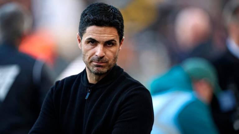 Arsenal’s Spanish manager Mikel Arteta looks on ahead of kick-off in the English Premier League football match between Wolverhampton Wanderers and Arsenal at the Molineux stadium in Wolverhampton, central England on April 20, 2024/AFPPix