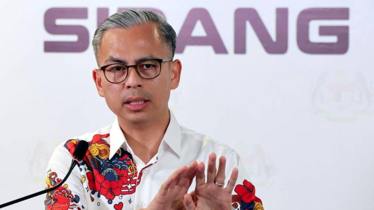 Communications Minister and Unity Government spokesperson Datuk Fahmi Fadzil speaks at the weekly Cabinet press conference at Menara Komunikasi today. - BERNAMAPIX