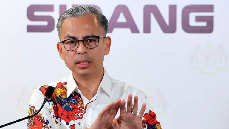 Communications Minister Datuk Fahmi Fadzil - Photo by BERNAMA