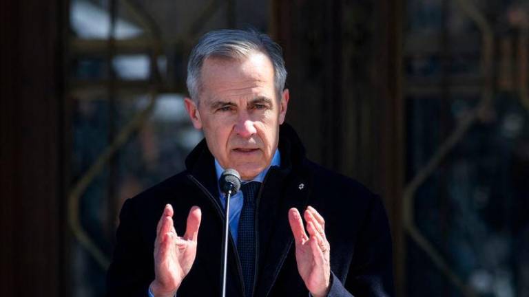 Canada’s Prime Minister Mark Carney announces a federal election, after his meeting at Rideau Hall with Governor General Mary Simon to dissolve parliament, in Ottawa - REUTERSpix