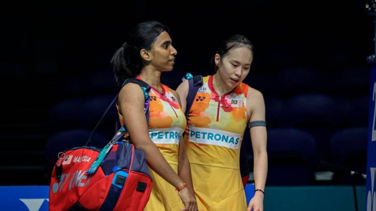 National women’s doubles pair Pearly Tan-M. Thinaah