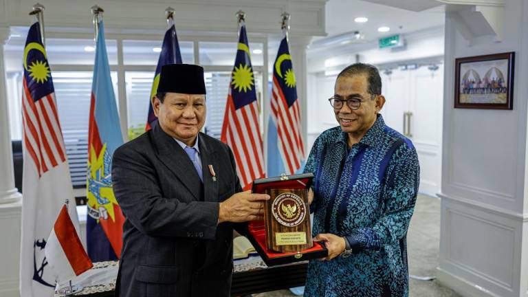 Defence Minister, Prabowo Subianto (left) and Defence Minister Datuk Seri Mohamed Khaled Nordin/BERNAMAPix