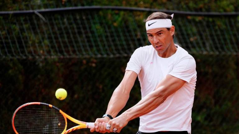 Spain’s Rafael Nadal plays a backhand return during a training on the eve of his match during the ATP Barcelona Open “Conde de Godo” tennis tournament, in Barcelona, on April 15, 2024/AFPPix