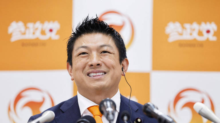 Japan’s opposition Sanseito party leader Sohei Kamiya smiles as he speaks to the members of the media, on the day of the upper house election, at the party's election operation center in Tokyo, Japan July 20, 2025, in this photo taken by Kyodo. - Kyodo/via REUTERS