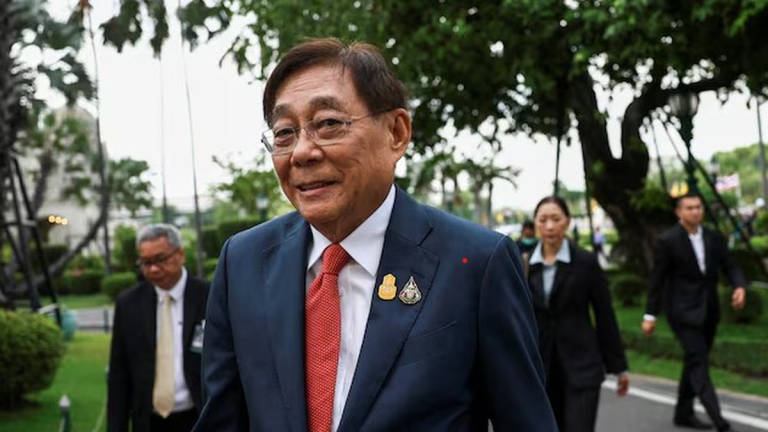Thailand’s new Finance Minister and Deputy Prime Minister Pichai Chunhavajira reacts on the day of the cabinet meeting at Thai Government House in Bangkok, Thailand, May 7, 2024. - REUTERS