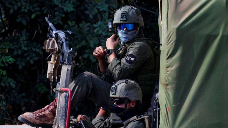 Israeli soldiers ready their kit, amid cross-border hostilities between Hezbollah and Israel, in northern Israel October 1, 2024. - REUTERSPIX