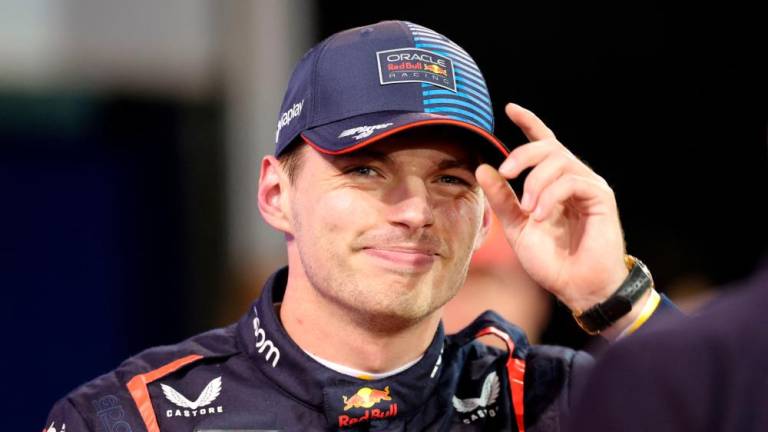 Red Bull Racing’s Dutch driver Max Verstappen celebrates after claiming the pole position in the Bahrain Formula One Grand Prix at the Bahrain International Circuit in Sakhir on March 1, 2024/AFPPix