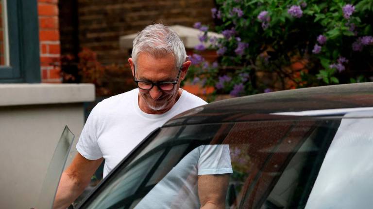 Football presenter Gary Lineker walks outside his home, after resigning from the BBC after 25 years of presenting Match of the Day, in London, Britain, May 19, 2025. REUTERS/Hannah McKay