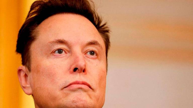 FILE PHOTO: Tesla and SpaceX CEO Elon Musk attends the inauguration of U.S. President-elect Donald Trump in the Rotunda of the U.S. Capitol on January 20, 2025 in Washington, DC. Chip Somodevilla/Pool via REUTERSpix