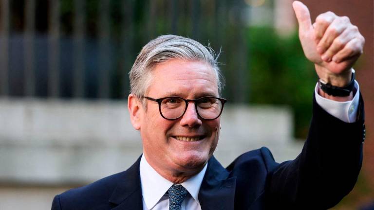 British Prime Minister Keir Starmer gestures during a reception, following the UK-EU summit, in London, Britain, May 19, 2025. REUTERSpix