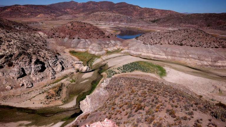 A general view of the dried Cogoti reservoir, as water levels in the zone dropped to record lows, ahead of World Water Day at La Ligua area, in Coquimbo, Chile March 14, 2024. - REUTERSPIX