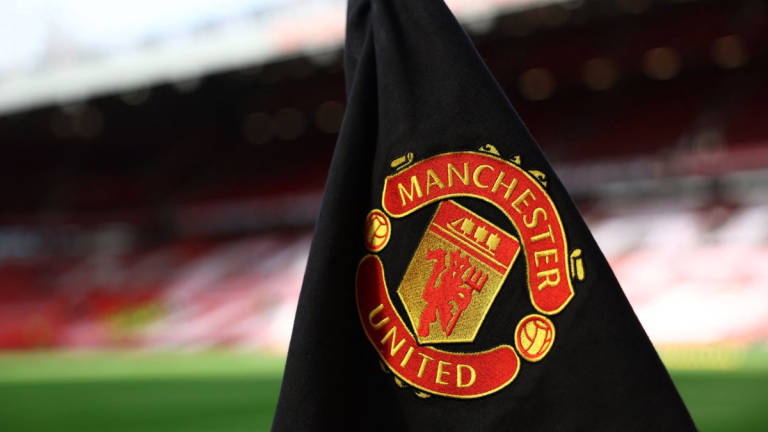 General view of a Manchester United corner flag inside the stadium before the match on October 29, 2023. - REUTERS