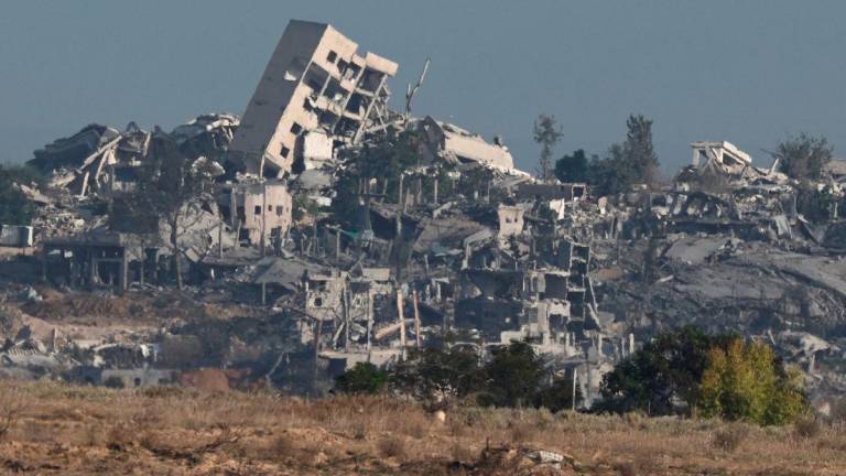 Destroyed buildings in Gaza, as seen from Israeli side of the Israel-Gaza border, in Israel, September 21, 2025. REUTERS/Amir Cohen
