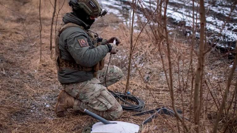A Ukrainian serviceman of 47th brigade prepares a Starlink satellite internet systems at his positions at a front line, amid Russia’s attack on Ukraine, near the town of Avdiivka, recently captured by Russian troops in Donetsk region, Ukraine. Reuterspix
