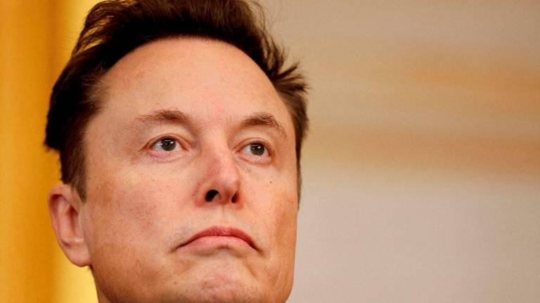 FILE PHOTO: Tesla and SpaceX CEO Elon Musk attends the inauguration of U.S. President-elect Donald Trump in the Rotunda of the U.S. Capitol on January 20, 2025 in Washington, DC. Chip Somodevilla/Pool via REUTERS/File Photo
