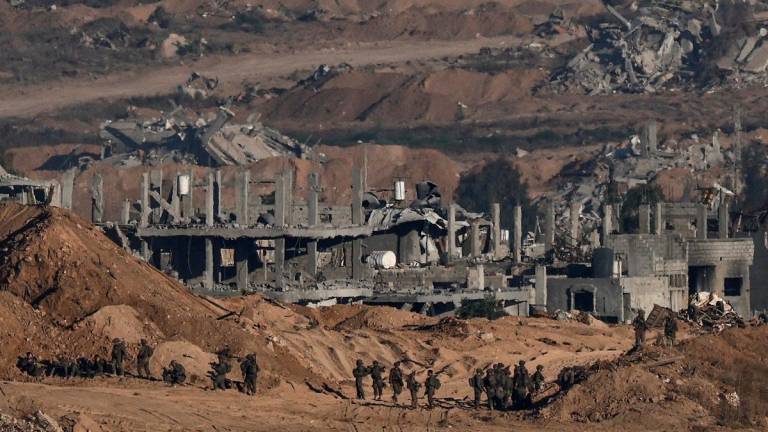Israeli soldiers operate in Gaza, as seen from the Israeli side of the border, July 6, 2025. - REUTERS/Amir Cohen