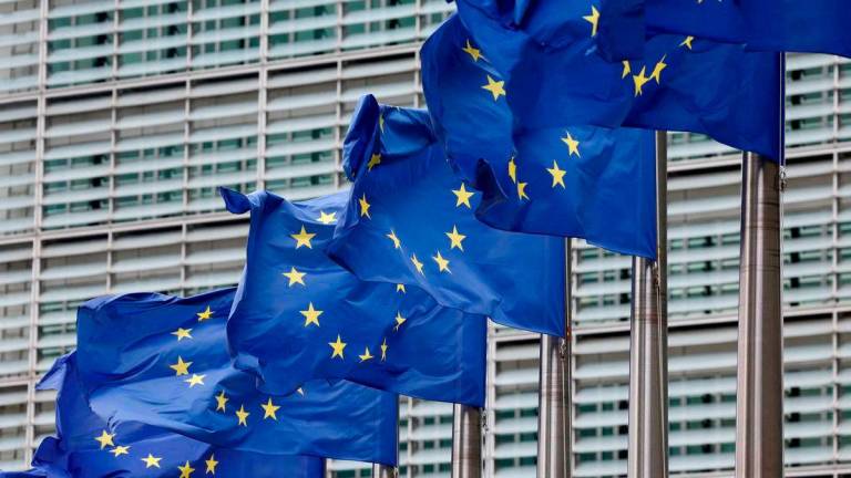 FILE PHOTO: FILE PHOTO: European Union flags flutter outside the EU Commission headquarters in Brussels, Belgium July 16, 2025 - REUTERS