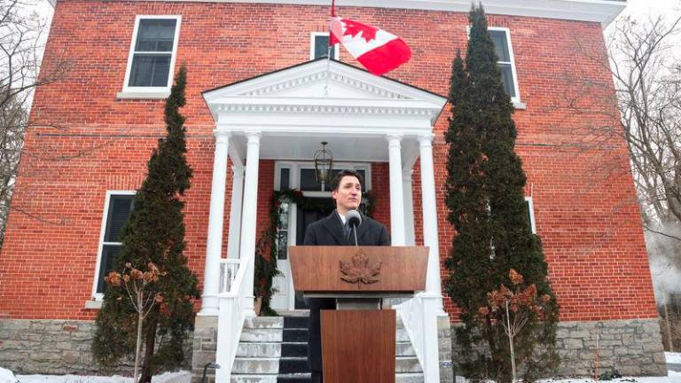 Canada's Prime Minister Justin Trudeau speaks to reporters, announcing he intends to step down as Liberal Party leader, but he will stay on in his post until a replacement has been chosen, from his Rideau Cottage residence in Ottawa, Ontario, Canada, January 6, 2025. - REUTERSPIX