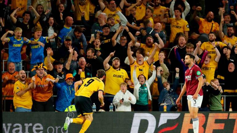 Wolverhampton Wanderers’ Jorgen Strand Larsen celebrates scoring their third goal. Action Images via Reuters/Andrew Boyers