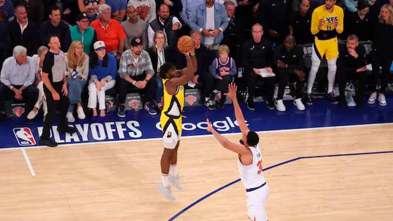May 29, 2025; New York, New York, USA; Indiana Pacers forward Jarace Walker (5) shoots against New York Knicks center Karl-Anthony Towns (32) in the fourth quarter during game five of the eastern conference finals for the 2025 NBA Playoffs at Madison Square Garden. Mandatory Credit: Brad Penner-Imagn Images