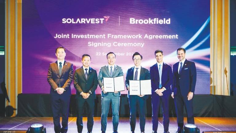 From left: Solarvest executive director Edmund Tan, managing director Lim Chin Siu, Chong, Cheng, Brookfield renewable power and transition senior vice-president Stefano Ghezzi and Solarvest chief investment officer Daniel Ruppert.