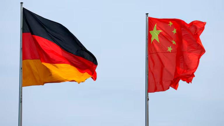 The flags of Germany and China are seen ahead of a meeting between German Chancellor Olaf Scholz and Chinese Premier Li Qiang in Berlin, Germany, June 19, 2023. REUTERS/Fabrizio Bensch/File photo