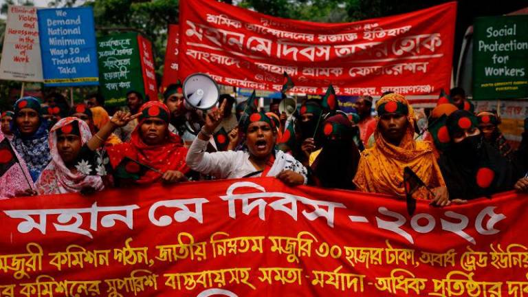 Bangladeshi workers chant slogans as they participate in a rally to celebrate May Day, in Dhaka, Bangladesh, May 1, 2025. REUTERSpix