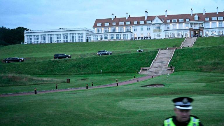 US President Donald Trump and his delegation arrive at the Trump Turnberry Golf Courses, in Turnberry, on the south west coast of Scotland - AFPPix