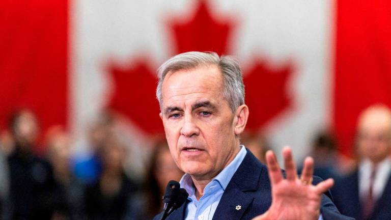 Canada’s Prime Minister Mark Carney delivers remarks at Marmen Inc., a steel fabrication and machining company, during his Liberal Party election campaign tour in Trois-Rivieres, Quebec Canada April 22, 2025. REUTERSpix