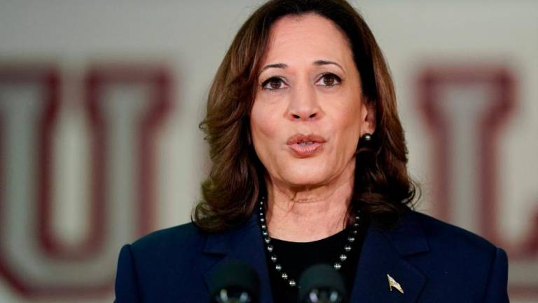 US Vice President Kamala Harris speaks to the press about gun safety measures at the high school in Parkland, Florida, March 23, 2024. - AFPPIX