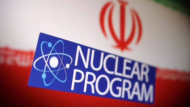 Iranian flag, atom symbol and words “Nuclear program” are in this illustration taken June 16, 2025. - REUTERS