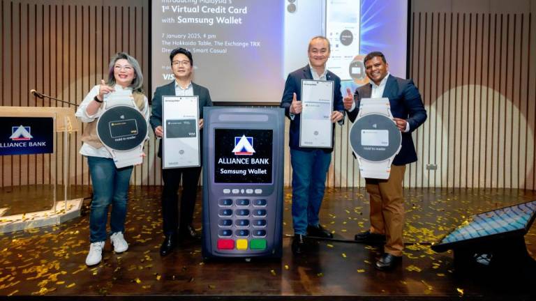 From left: Alliance Bank group chief consumer banking officer Gan Pai Li, Samsung Malaysia Electronics president Charles Kim, Alliance Bank group CEO Kellee Kam and Visa Asia Pacific global acquirers head Previn Pillay launching the VCC.