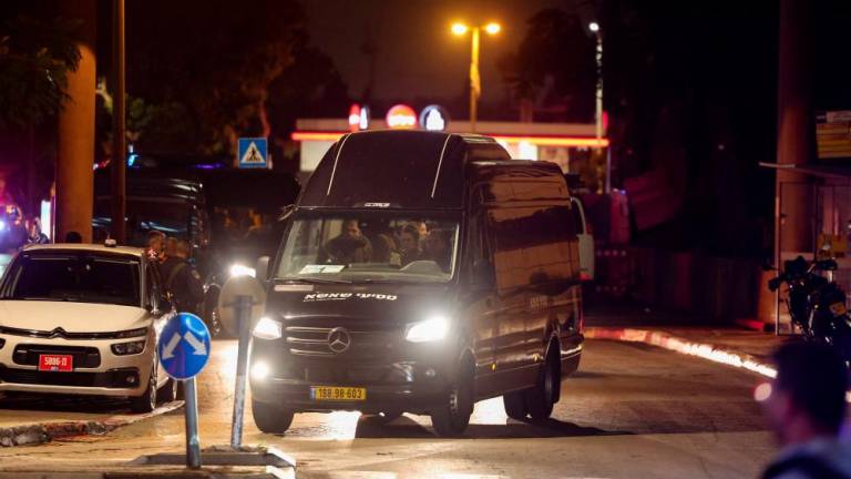 A convoy carrying Israeli hostages released by Hamas from the Gaza Strip arrives at the Sheba Medical Center in Ramat Gan, on November 26, 2023. - AFPPIX