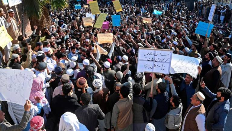 Muslims protest against Supreme Court Chief Justice Qazi Faez Isa, in Peshawar on February 23, 2024. - AFPPIX