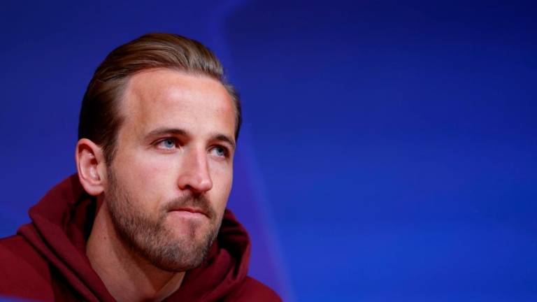 Bayern Munich’s English forward #09 Harry Kane attends a press conference on the eve of their UEFA Champions League quarter final second leg football match against Arsenal, at the Allianz Arena Stadium in Munich, southern Germany, on April 16, 2024/AFPPix
