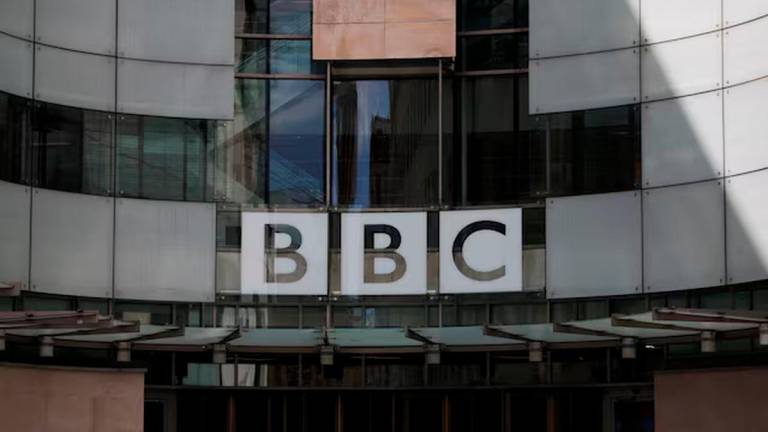 The BBC logo is displayed above the entrance to the BBC headquarters in London, Britain, July 10, 2023. REUTERS/Hollie Adams/File Photo