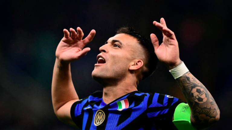 Inter Milan's Argentine forward #10 Lautaro Martinez celebrates after Inter Milan won the UEFA Champions League semi-final second leg football match between Inter Milan and FC Barcelona at the San Siro stadium in Milan on May 6, 2025. -AFPpix