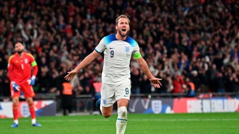 England seal Euro 2024 berth as Kane double sinks Italy