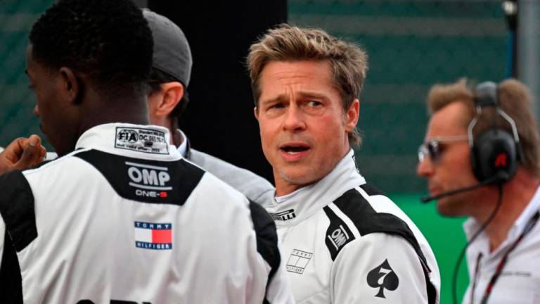 The film will feature Pitt driving a real Formula 1 racing car. – AFPPIC