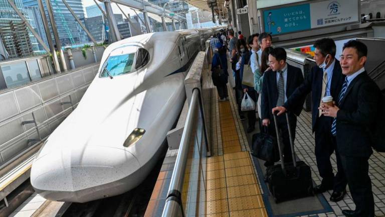 A passenger on the evening of April 16 alerted security to a 40-centimetre (nearly 16-inch) snake lurking on a train between Nagoya and Tokyo, resulting in a 17-minute hold-up. - AFPpix