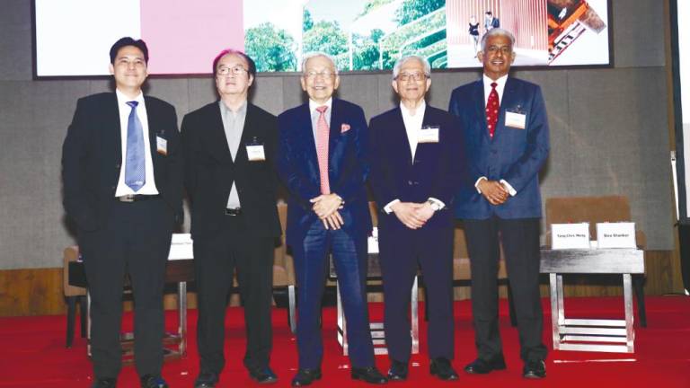 From left: Ho Chin Soon Research Sdn Bhd CEO Ishmael Ho, KGV International Property Consultancy (Johor) Sdn Bhd director Samuel Tan, Rahim &amp; Co International Sdn Bhd chairman Tan Sri Abdul Rahim Abdul Rahman, Tang, Rahim &amp; Co International CEO Siva Shankerm after the panel discussion.