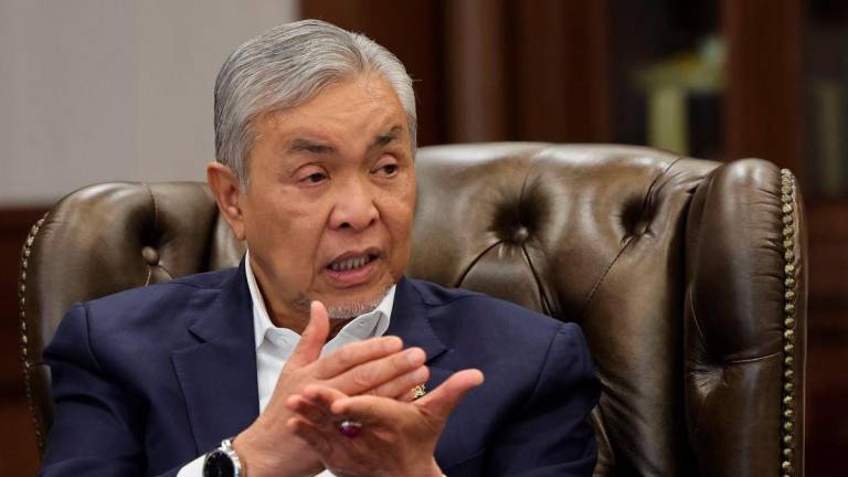 Deputy Prime Minister, Datuk Seri Dr Ahmad Zahid Hamidi, during an exclusive interview with Bernama at his office in the Perdana Putra Building recently. – BERNAMA