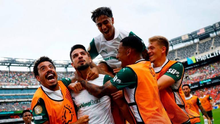 Palmeiras’ Jose Lopez celebrates scoring their second goal with teammates REUTERSpix