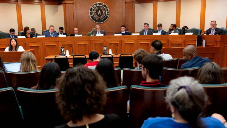 Members of the public listen to proceedings during a State Senate hearing regarding redistricting at the Texas State Capitol in Austin, Texas, U.S. August 7, 2025. - REUTERSPIX