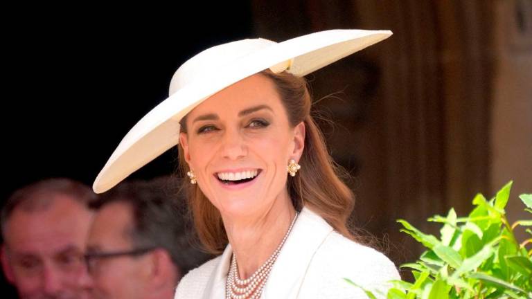 Britain’s Britain’s Catherine, Princess of Wales smiles as she attends the Order of the Garter service at St George’s Chapel in Windsor Castle, west of London, on June 16, 2025. (Photo by Yui Mok / POOL / AFP)