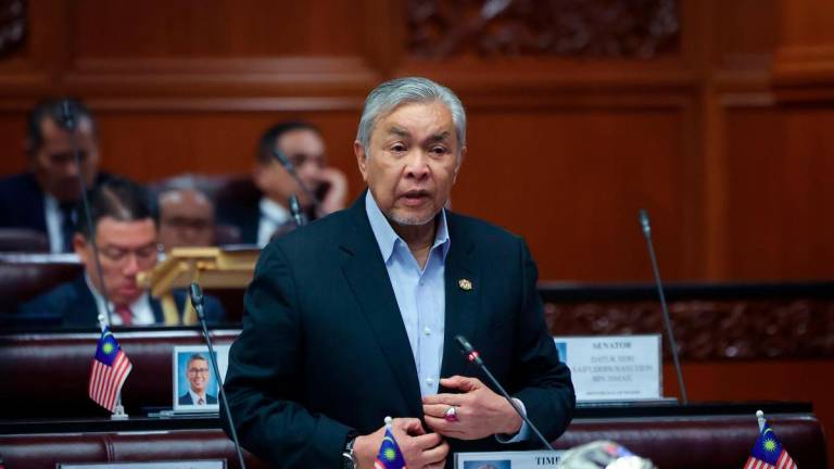 Deputy Prime Minister and Minister of Rural and Regional Development, Datuk Seri Dr Ahmad Zahid Hamidi, during the Second Meeting of the Fourth Session of the 15th Parliament at the Dewan Negara sitting in the Parliament Building today. – BERNAMA