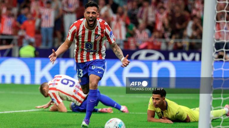Atletico Madrid's Argentine midfielder Nico Gonzalez celebrates scoring their second goal during the Spanish league football match between Club Atletico de Madrid and Villarreal CF at the Metropolitano Stadium in Madrid on September 13, 2025. - AFP