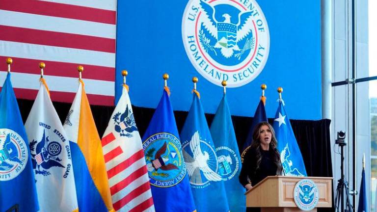 Homeland Security Secretary Kristi Noem speaks to employees at the Department of Homeland Security. REUTERSPIX